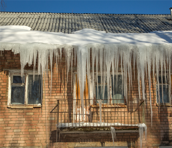Ice dam water damage repair near me in East Haven, CT.
